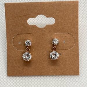 Gold tone with 2 cz diamonds studs